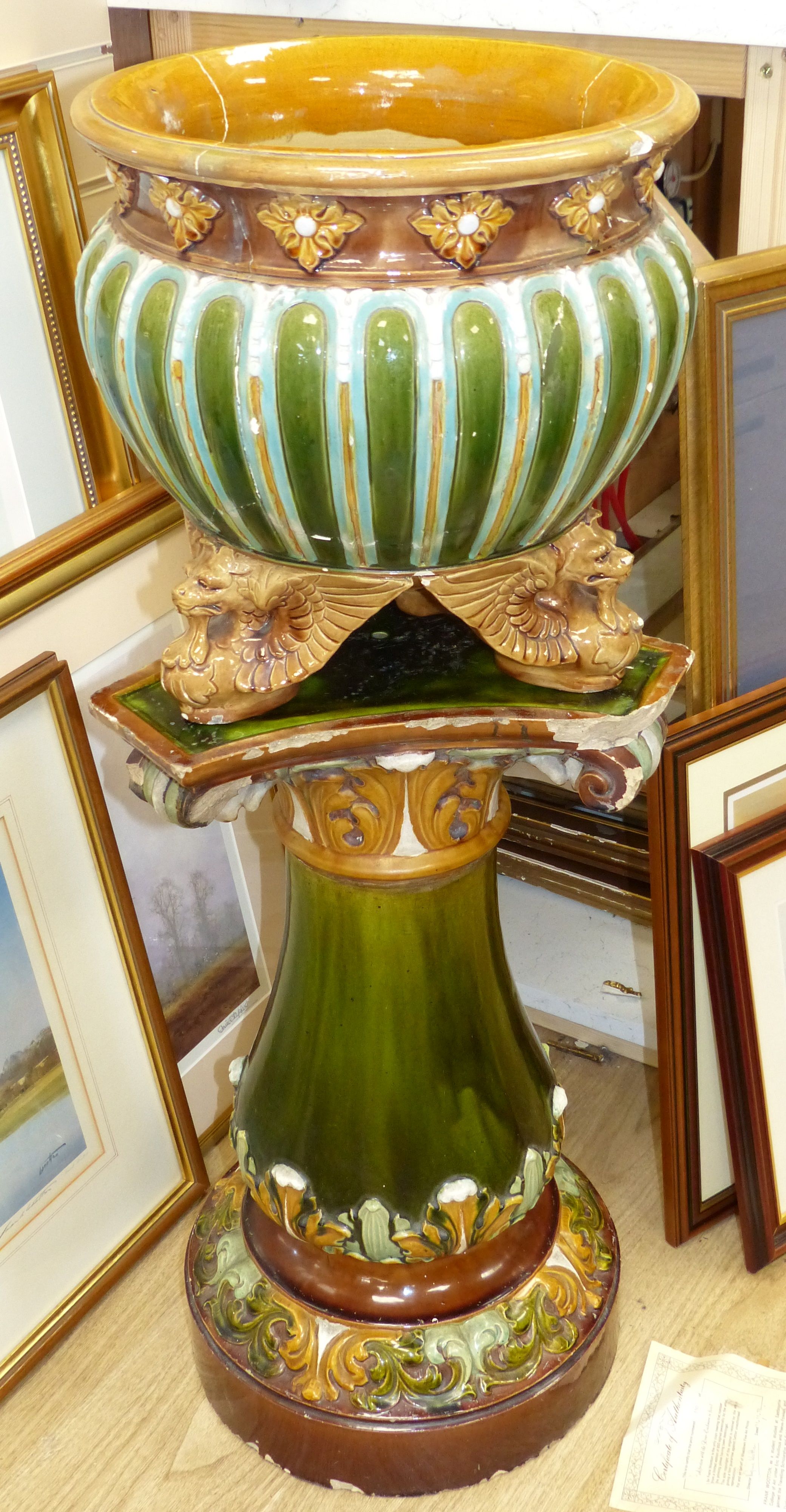 A Doulton Lambeth jardiniere on stand, overall height 92cm (a.f.), the stand apparently unmarked